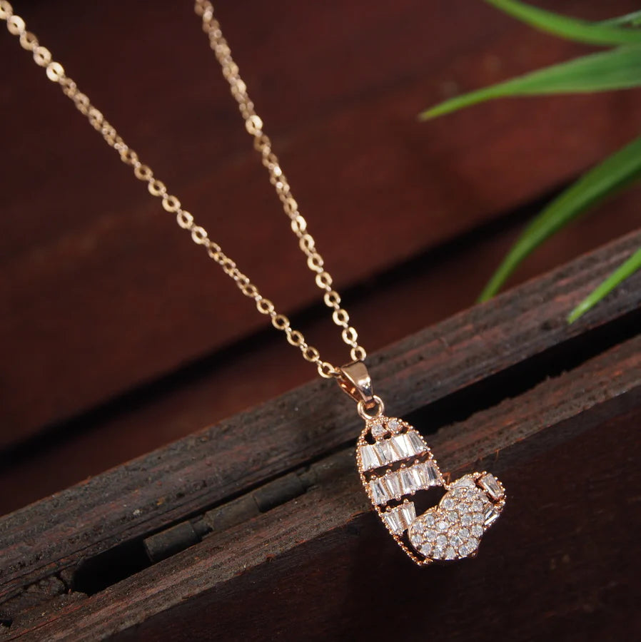 Stainless Steel Rosegold Plated Heart Shaped Spinning Pendent Necklace