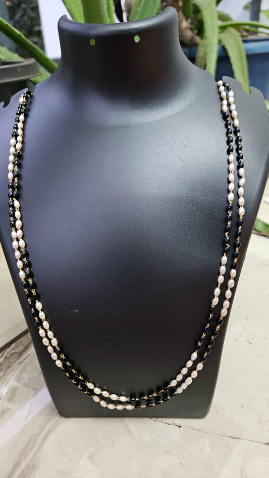Elegant Two-Layer Pearl and Black Bead Necklace