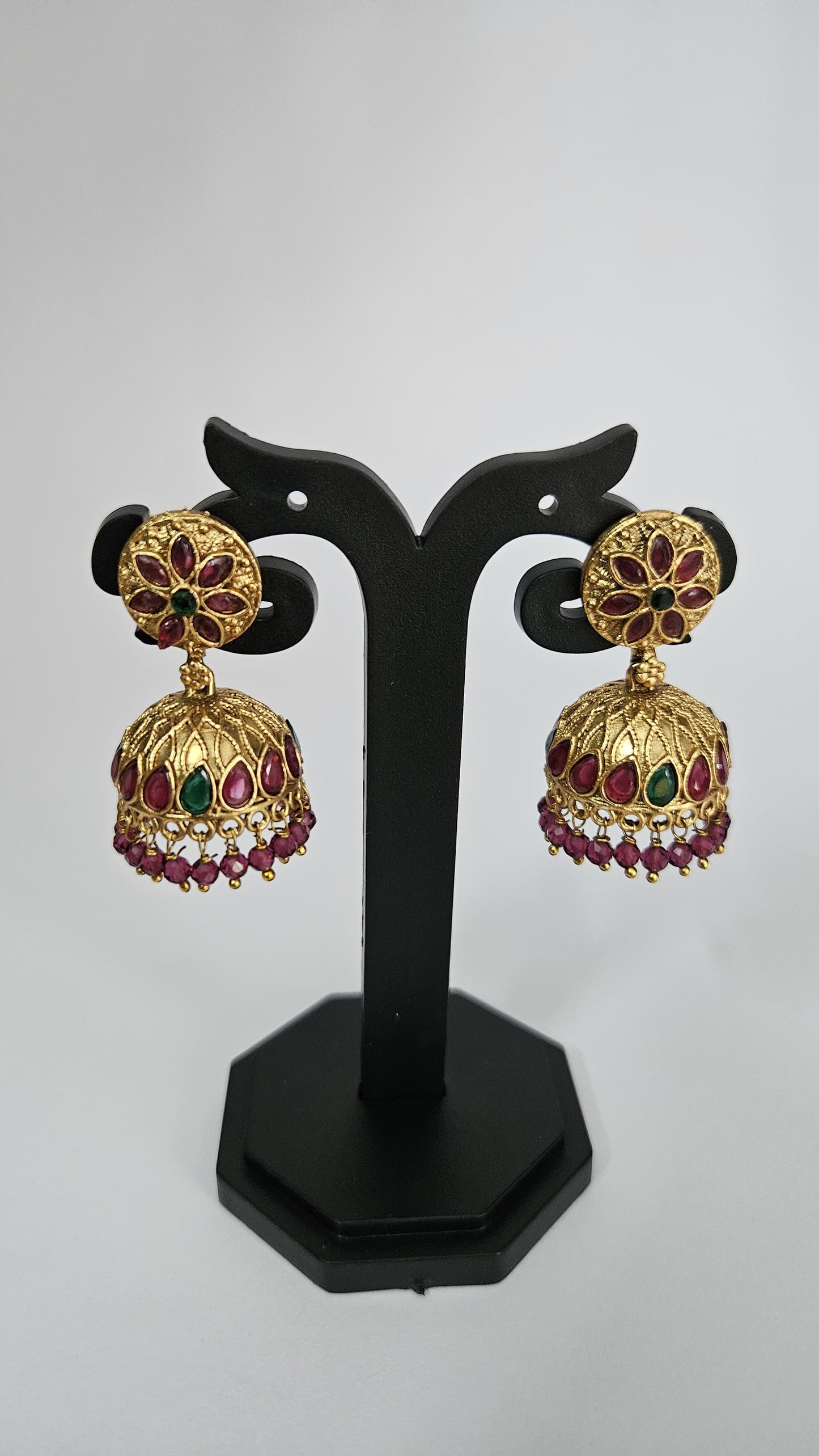 Gold-Toned Kundan Jhumka Earrings with Ruby & Emerald Detailing