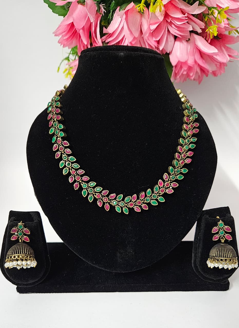 Antique Gold-Plated Floral Necklace Set with Jhumka Earrings – Ruby & Emerald Variants