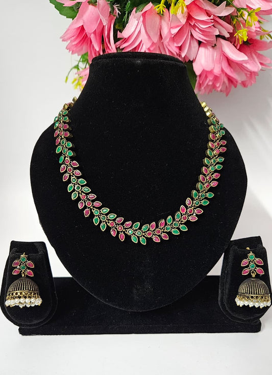 Antique Gold-Plated Floral Necklace Set with Jhumka Earrings – Ruby & Emerald Variants